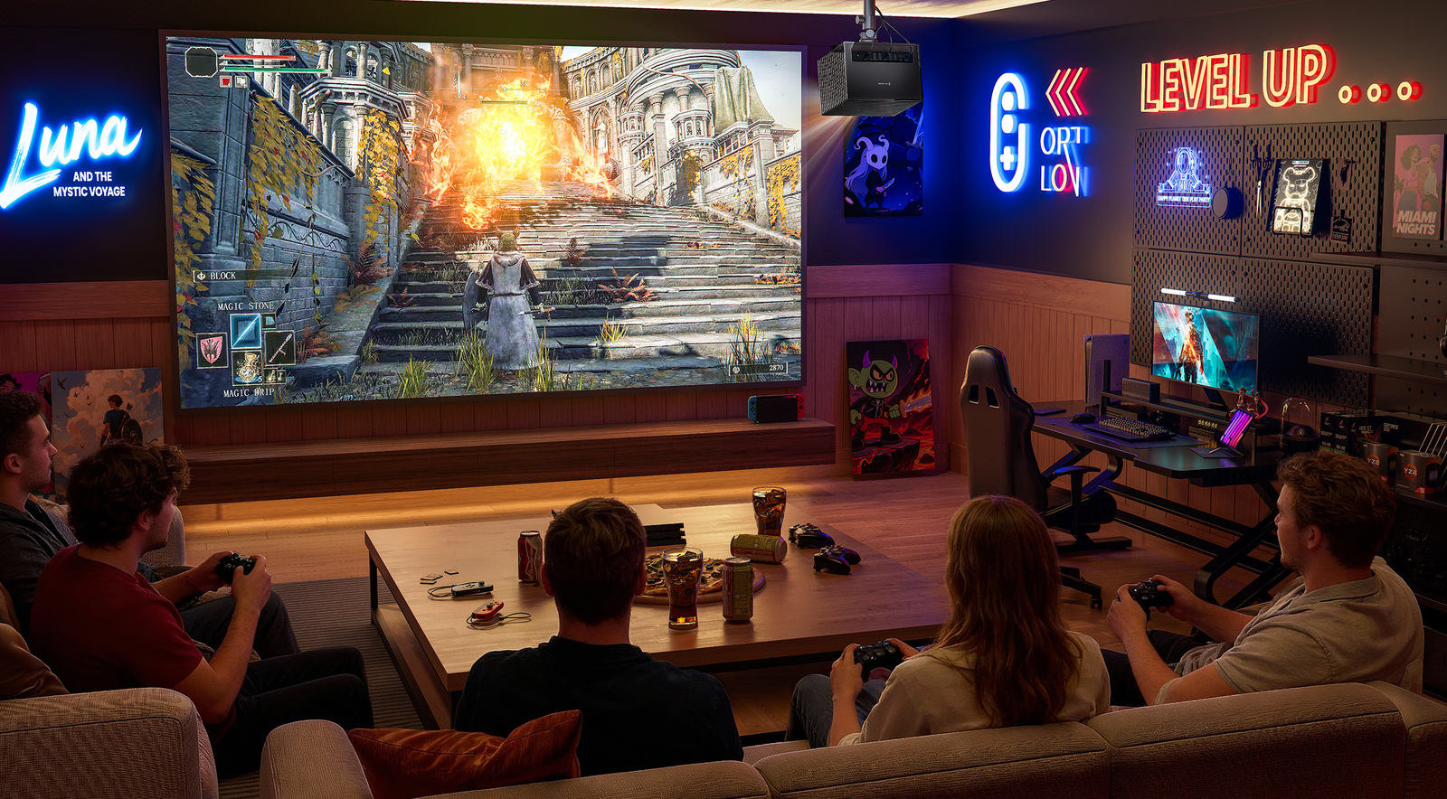 ゲームルームでAWOL Visionプロジェクターの大画面ゲーム映像を楽しむ友人たち。